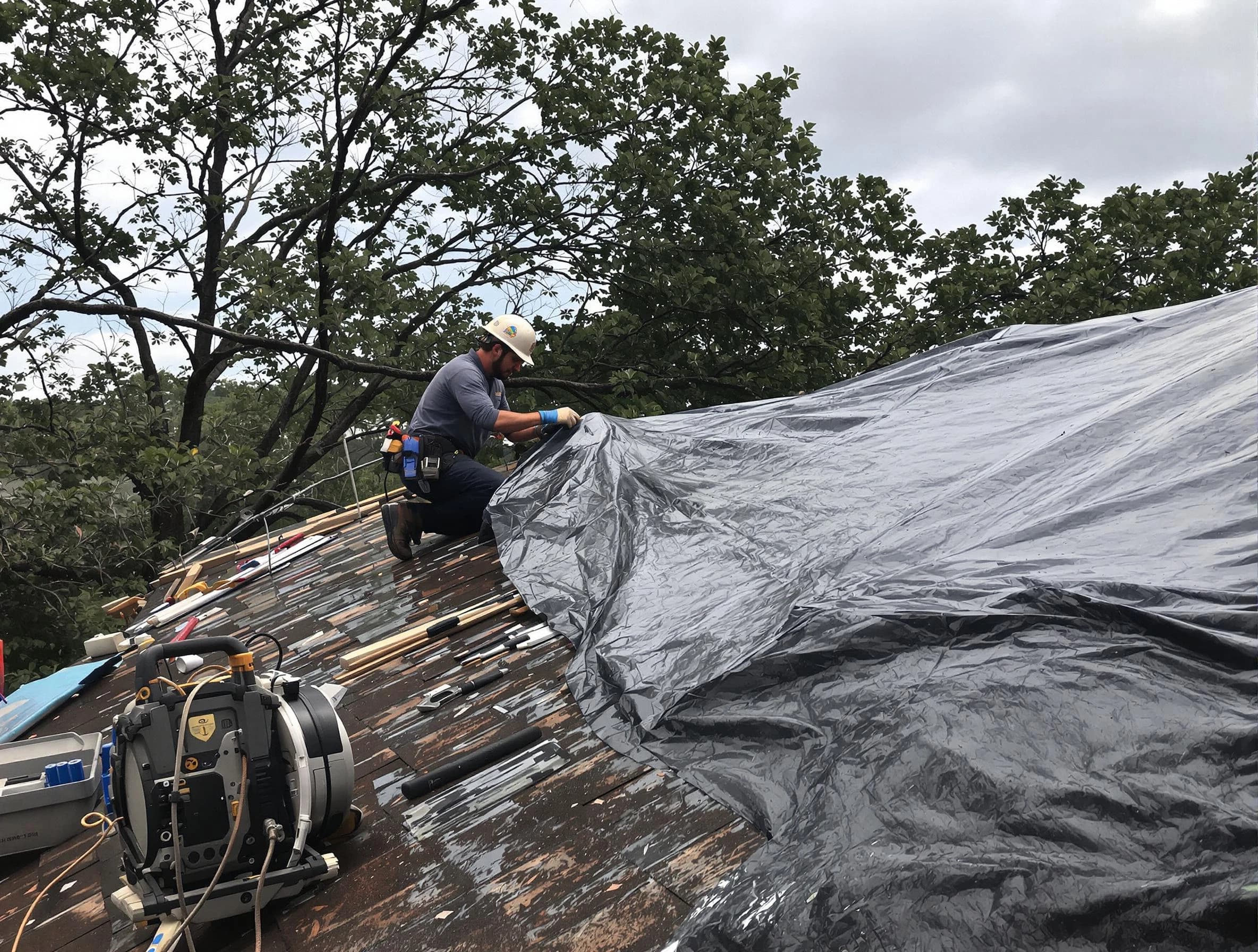 Green Roofing Company responding to an emergency roof repair call in Green, OH