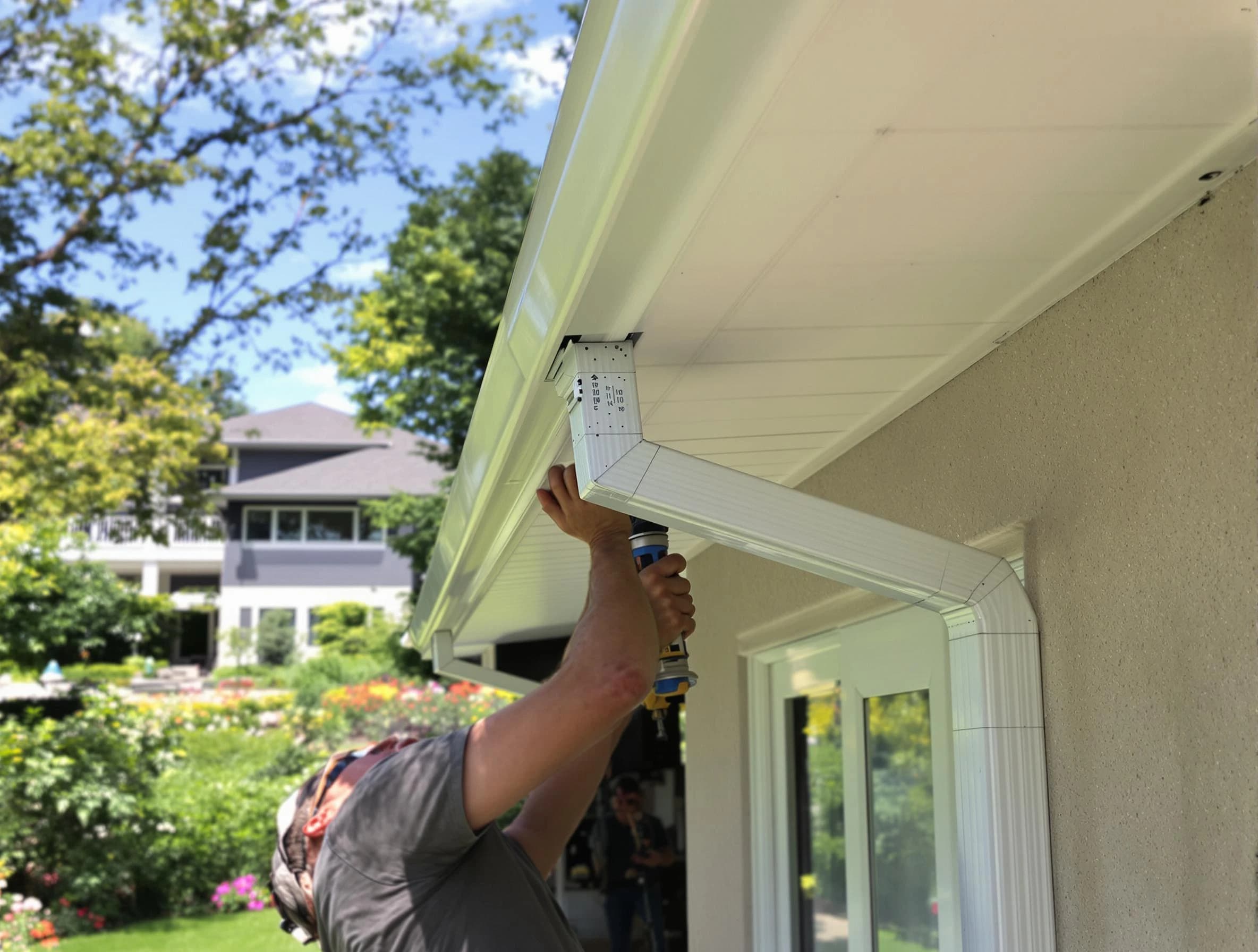 Green Roofing Company technicians performing gutter installation in Green, OH