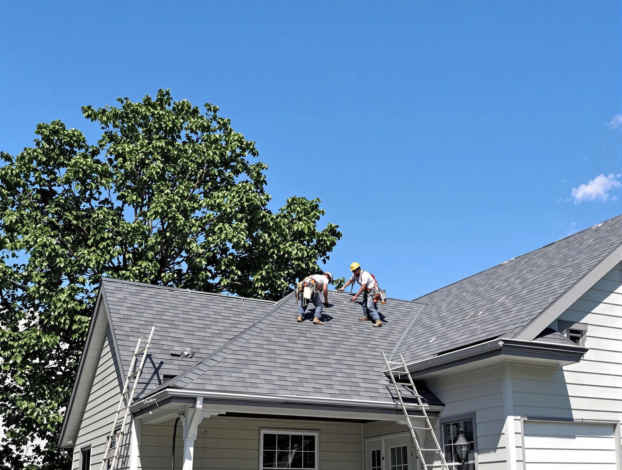 Green Roofing Company crew finalizing a roof installation in Green, OH