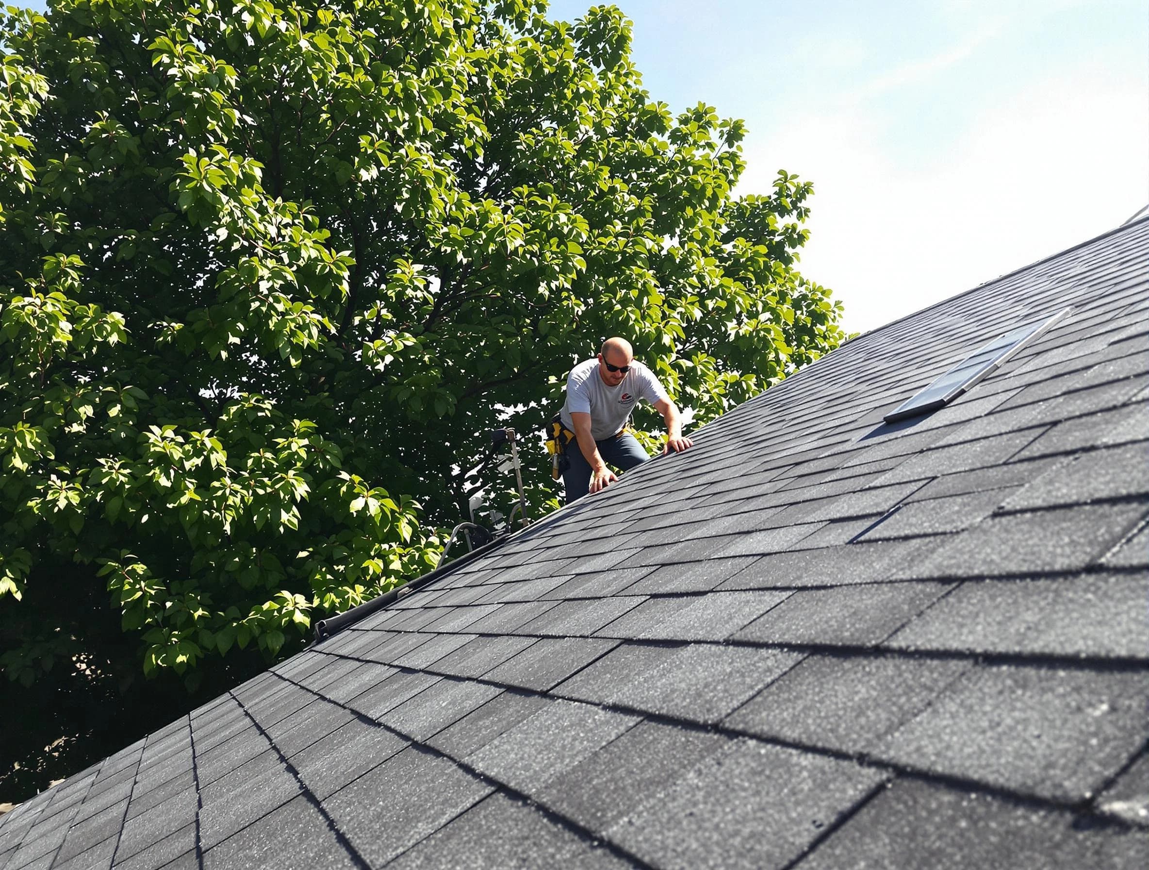 Certified roofers from Green Roofing Company working in Green, OH