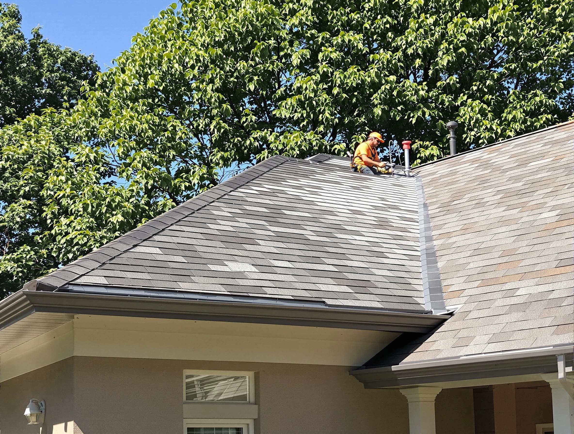 Newly completed shingle roofing by Green Roofing Company in Green, OH